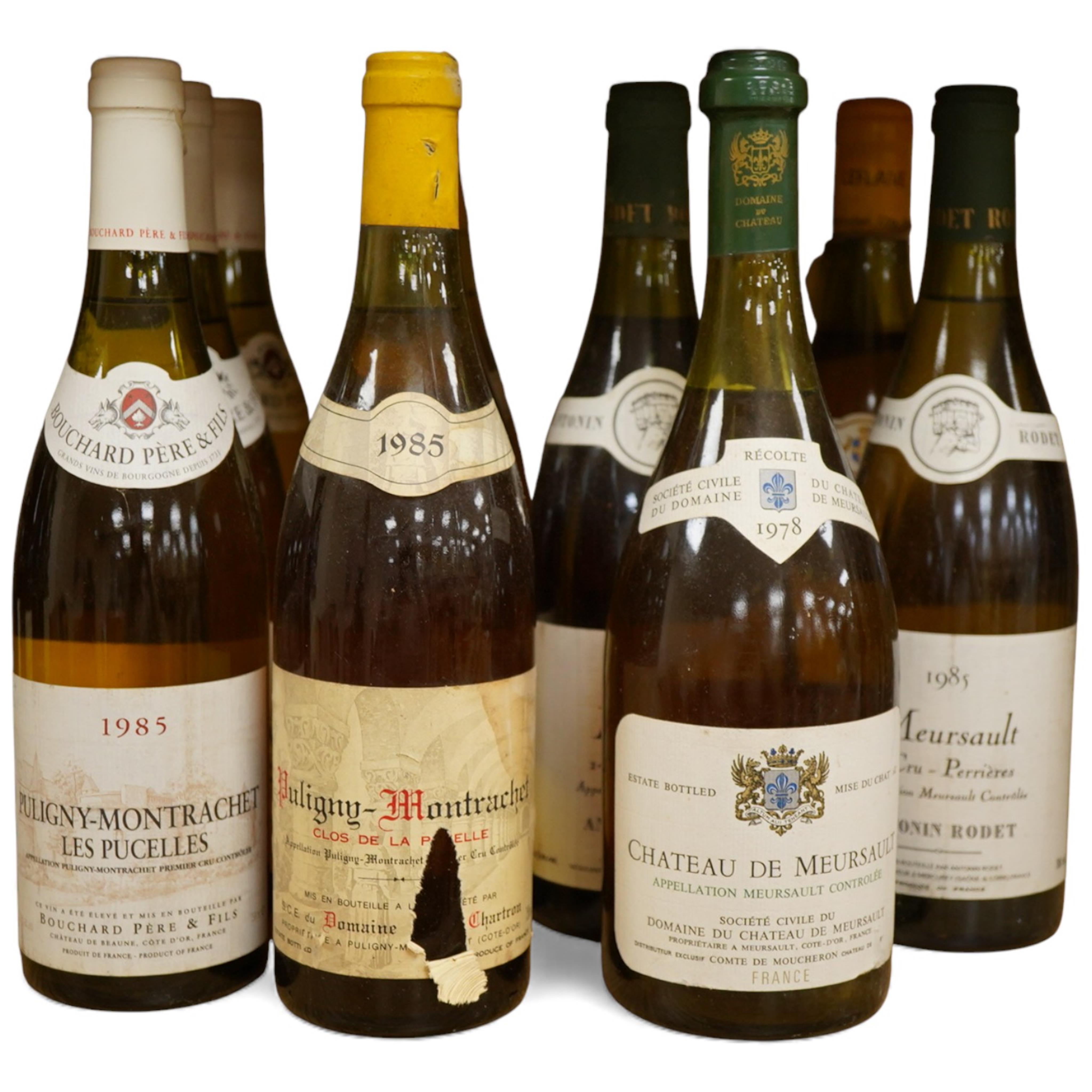 Eleven bottles of white burgundy including three Jean Chartron Puligny-Montrachet Premier Cru, 1985, two Antonin Rodet Meursault 1er Cru Perrieres, 1985, four various Puligny-Montrachet, a Domaine du Chateau de Meursault